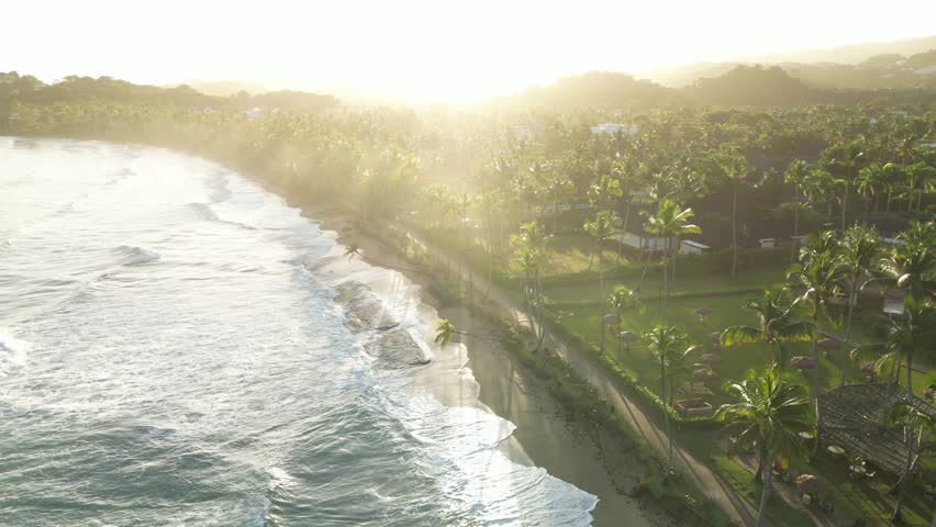 Morning light at Playa Bonita with soft pastel tones, calm ocean and greenery. Perfect for meditation and relaxation projects