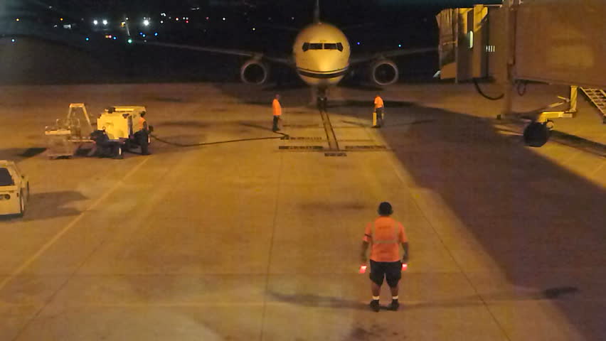 MAUI, HAWAII AIRPORT - CIRCA 2013: Airplane arrives at gate in Maui, Hawaii