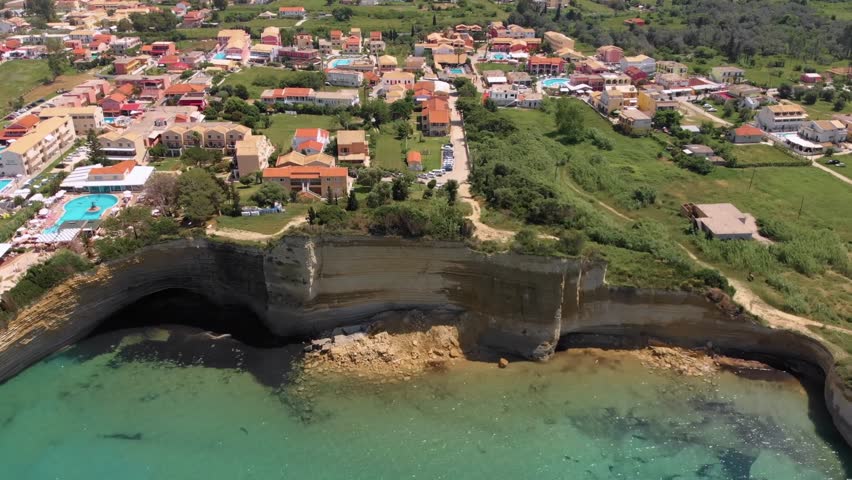 An aerial drone shot capturing the iconic Canal d'Amour in Sidari, Corfu, Greece.