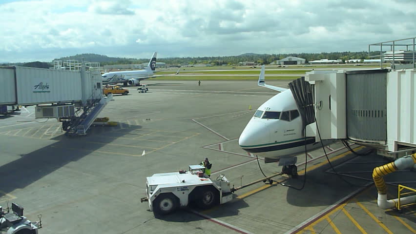 PORTLAND, OREGON AIRPORT - CIRCA 2013: Airplane departing at gate in Portland,