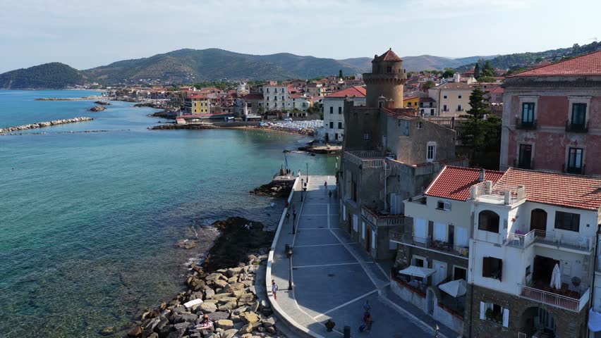The seafront of Santa Maria di Castellabate, a tourist destination in southern Italy.
Aerial view of the beach and the seaside village of Cilento. 4K