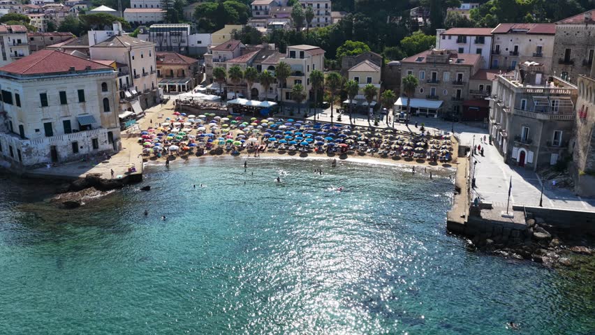 The seafront of Santa Maria di Castellabate, a tourist destination in southern Italy.
Aerial view of the beach and the seaside village of Cilento. 4K