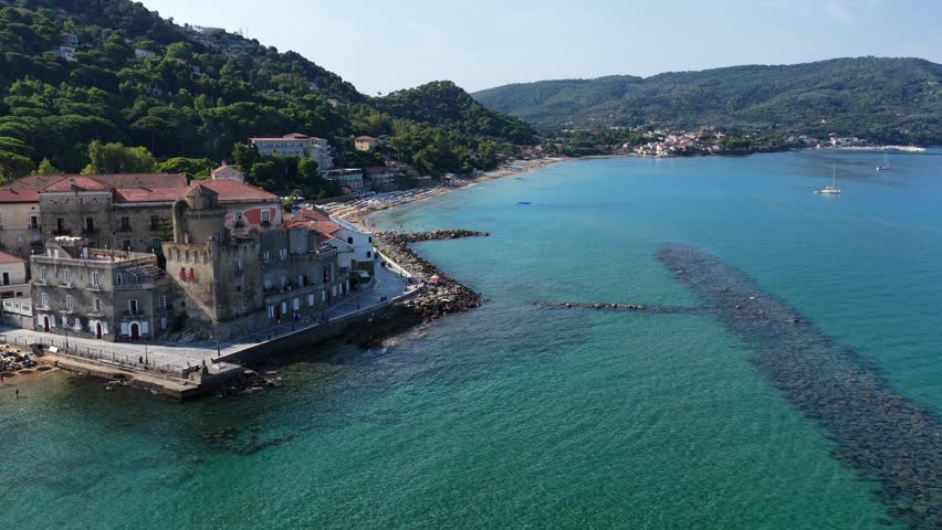 Santa Maria di Castellabate, a tourist destination in southern Italy.
Aerial view of the beach and the seaside village of Cilento. 4K