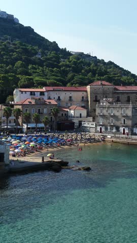 The seafront of Santa Maria di Castellabate, a tourist destination in southern Italy.
Aerial view of the beach and the seaside village of Cilento. 4K