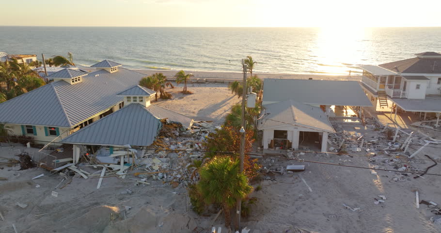 Natural disaster and its consequences. Hurricane destroyed house roof and walls in Florida coastal area.