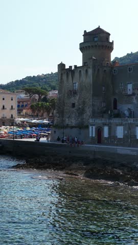 The seafront of Santa Maria di Castellabate, a tourist destination in southern Italy.
Aerial view of the beach and the seaside village of Cilento. 4K