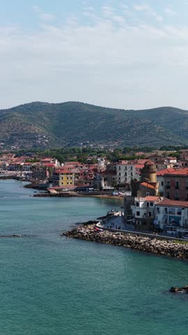 The seafront of Santa Maria di Castellabate, a tourist destination in southern Italy.
Aerial view of the beach and the seaside village of Cilento. 4K