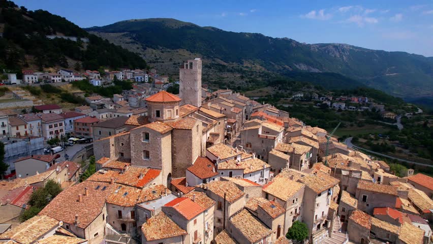 Abruzzo tourism, Italy . The most beautiful italian villages (borgo) Castel del Monte - Located in Gran Sasso mountain range. aerial drone panoramic view of picturesque postcard hilltop town.