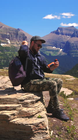 Embark on a captivating and unforgettable journey through the breathtaking and stunning scenery of Glacier National Park, vividly showcasing majestic mountains and lush, vibrant greenery all around