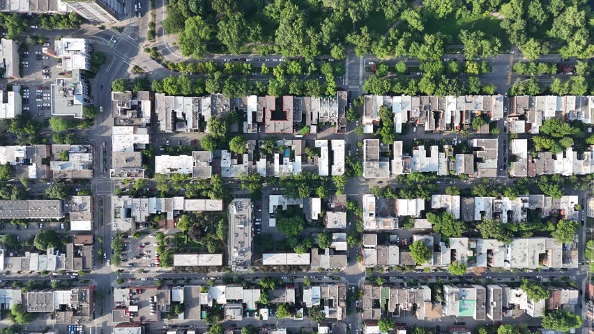 Drone flight above the La Fontaine park in summer, downtown in the background. Montreal, Quebec, Canada...