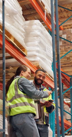 Discussion, cellphone and people in warehouse, logistics and supply chain with social media. Employees, smartphone and man with woman, internet and email with manufacturing factory and conversation