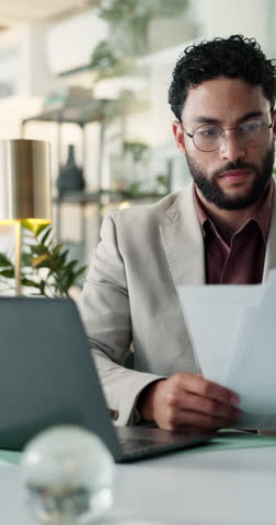 Laptop, accountant and businessman with paperwork for budget comparison, issue or fraud. Financial portfolio, audit review or investment banker with documents for accounting, taxes or profit report