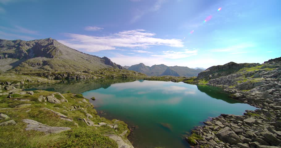 Flare on a fantastic alpine lake
