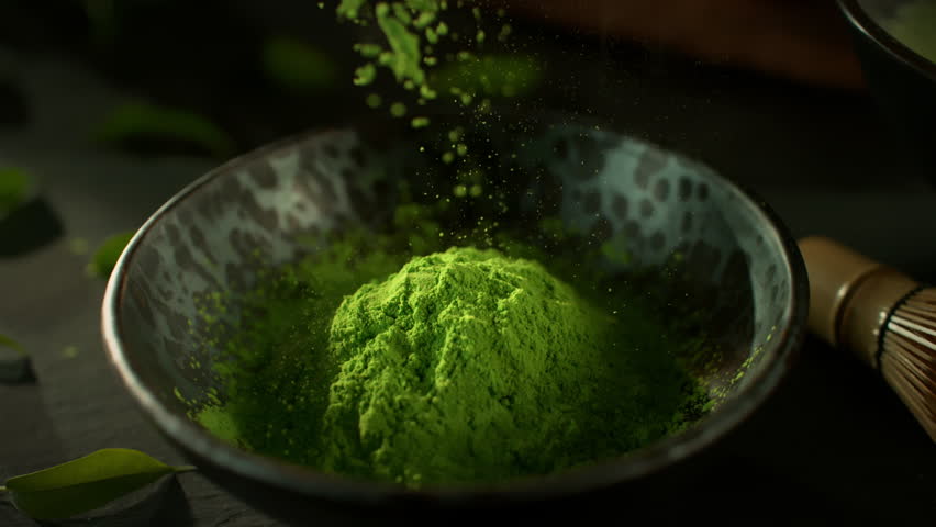 Super Slow Motion Shot of Falling Matcha Powder into a Bowl with Camera Motion at 1000fps.