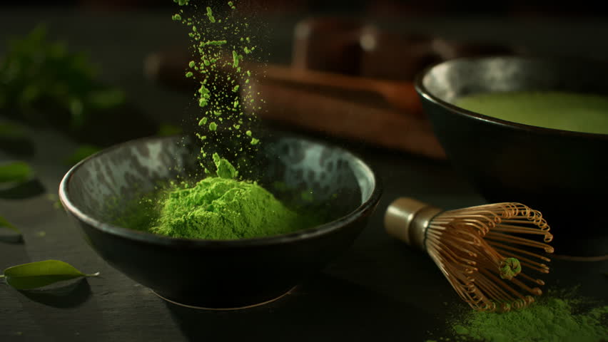 Super Slow Motion Shot of Falling Matcha Powder into a Bowl with Camera Motion at 1000fps.