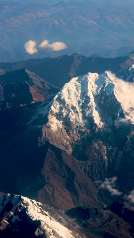 Experience the stunning, raw beauty of the Andes in Peru. The majesty of the mountains, showcasing a peaceful landscape ideal for travel, adventure, and nature-themed projects.