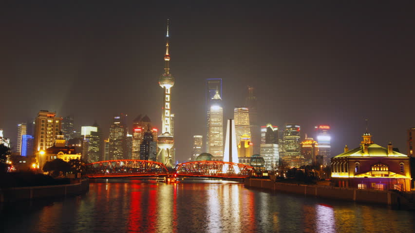 Time lapse of Shanghai Garden Bridge skyline at night - view from suzhou river,