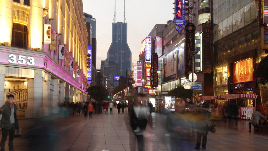 SHANGHAI - DECEMBER 19: Time lapse of Nanjing Road at night - Nanjing Road is