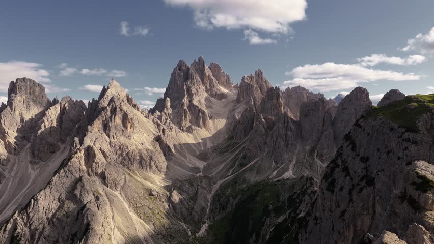 Cadini di Misurina mountain range with dramatic textures and sharp peaks under cloudy sky