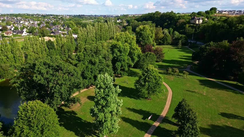 The Ondine Park aka Le Parc des Ondines in a pretty wooded park side from above, Changé, Mayenne, France.