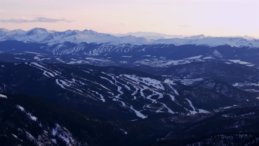 Winter Spring Keystone Breckenridge Ski Resort sunset golden hour Loveland Pass Colorado aerial drone Continental Divide Rocky Mountains ski trail runs Quandary Peak Boreas Pass circle right motion