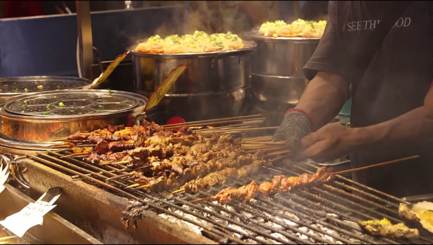 BBQ satay sold in a stall at a night market
