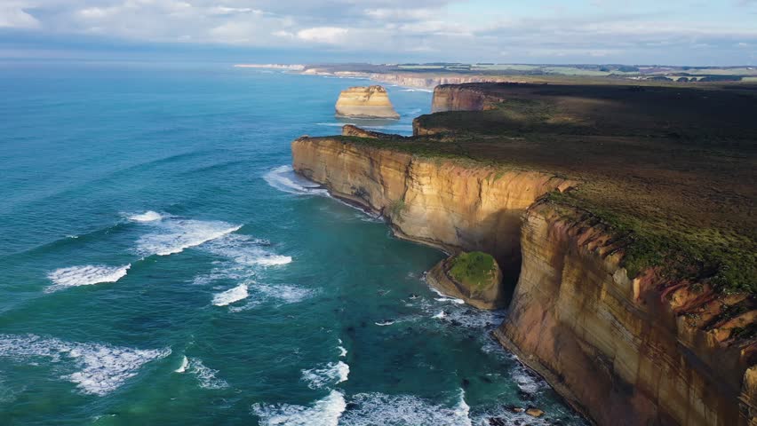A scenic view of the iconic Twelve Apostles rock formations located in Port Campbell National Park in Victoria, Australia