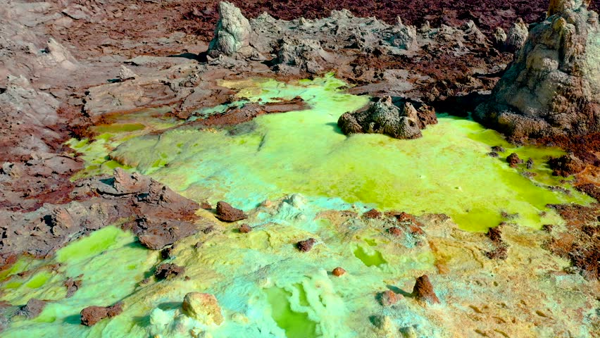 An aerial view of the vividly colored geothermal pools of the Dallol region in Ethiopia Danakil Depression