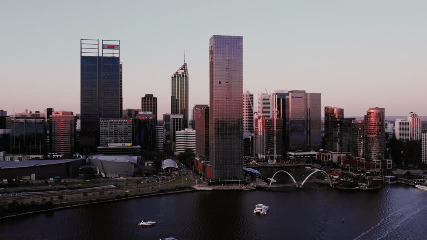 PERTH, AUSTRALIA - OCTOBER 22, 2023: Dusk casts a colorful glow over Perth