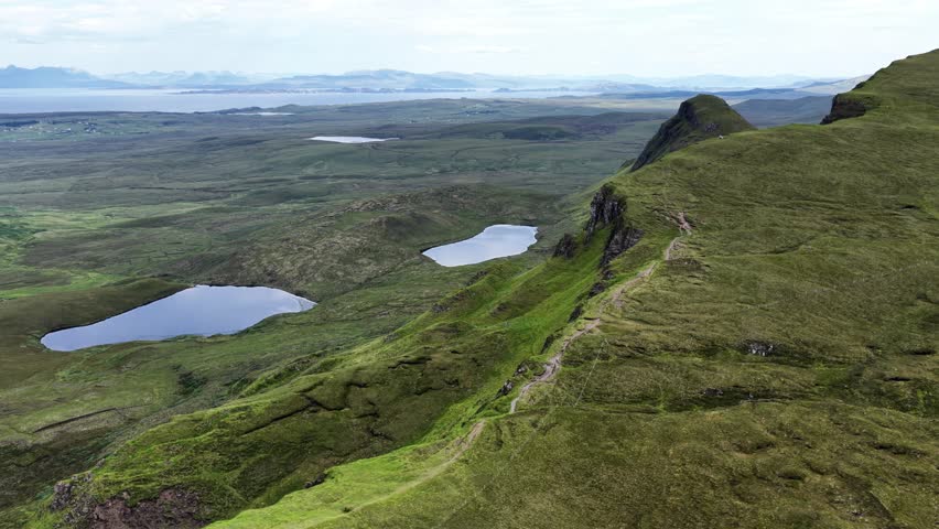 Stunning aerial view of Isle of Skye showcasing rugged landscapes and serene lakes