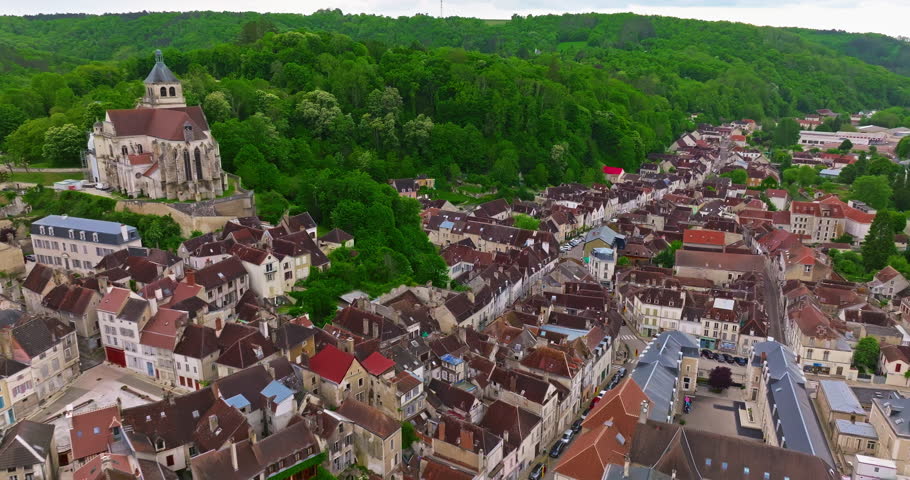 Aerial view of ancient town of Tonnerre with unusual water reservoir Fosse Dionne. Burgundy France