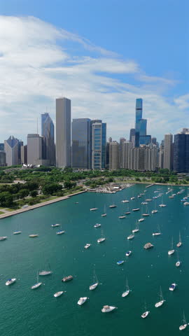 Cinematic drone footage of Chicago stunning skyline and aerial views. Enjoy beautiful parks and an inviting harbor, making it an ideal travel destination with diverse attractions for a memorable trip