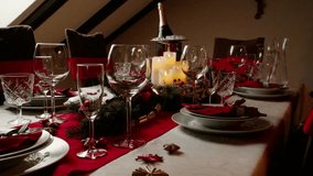 Festive christmas table setting with wine glasses, candles and elegant decoration - Powered by Shutterstock - Get 15% off with code: PIKWIZARD15