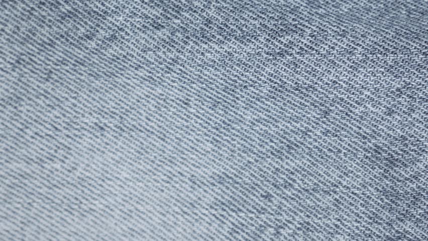Denim Stop Motion Background. Macro Jeans Fabric Animation.