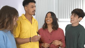 Dynamic student group collaborating, exchanging innovative project concepts during interactive university classroom learning session, demonstrating teamwork and creative problem-solving strategies - Powered by Shutterstock - Get 15% off with code: PIKWIZARD15