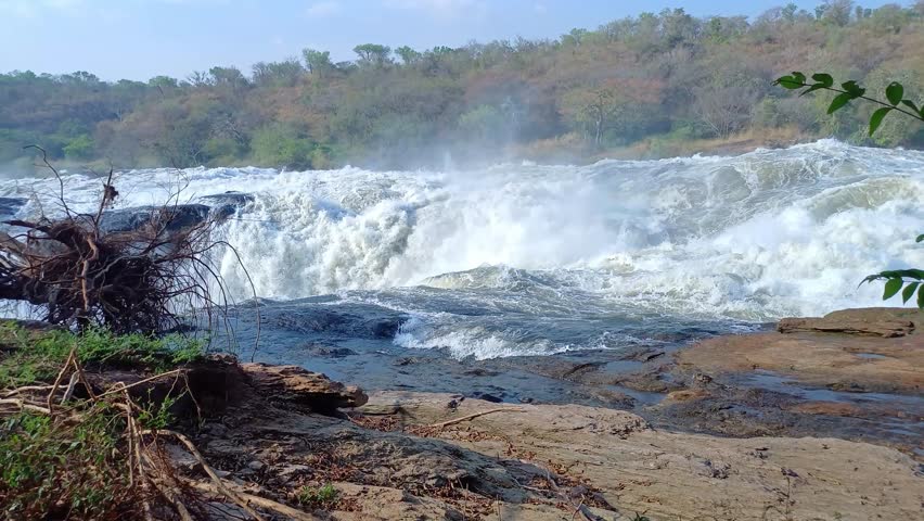 A ground-level view of Murchison Falls where Victoria Nile waters squeezing through a narrow gap in Uganda