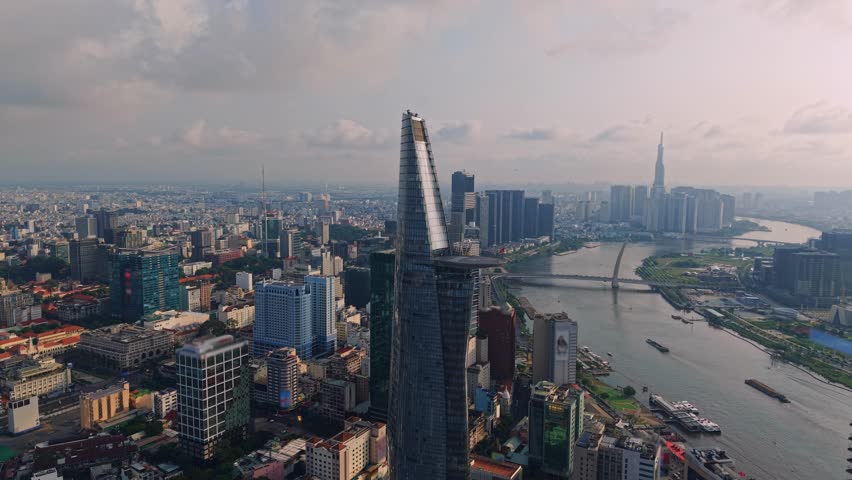 Aerial view Ho chi minh city and Saigon river in Vietnam, business center with skyscrapers.