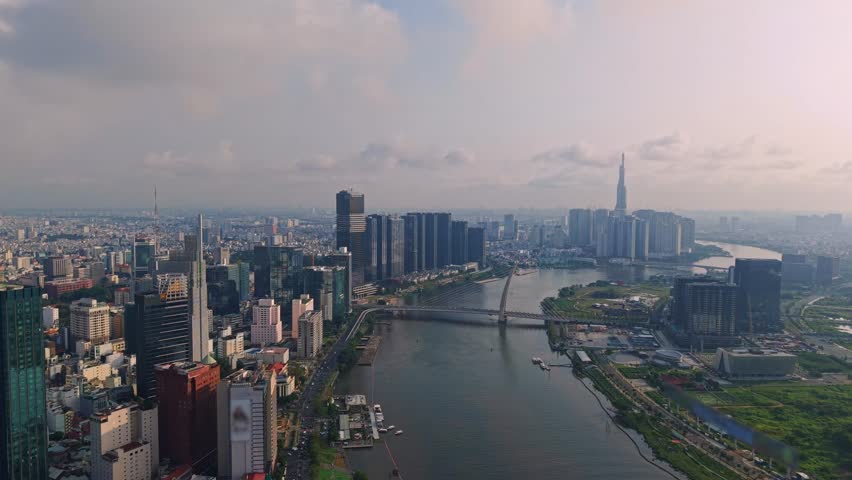 Aerial view Ho chi minh city and Saigon river in Vietnam, business center with skyscrapers.