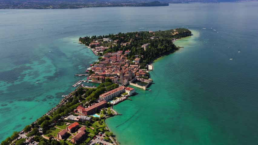Top down aerial approach to Sirmione and Scaliger Castle, Lake Garda, Italy