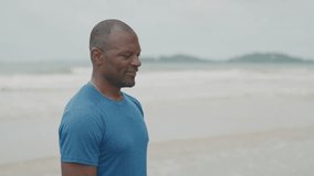 Loving African American Couple Embracing Affectionately on the Beach, Romantic Black Man and Woman Hugging Tenderly by the Seaside During a Peaceful Tropical Vacation - Powered by Shutterstock - Get 15% off with code: PIKWIZARD15