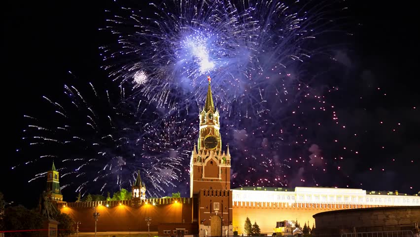Moscow Kremlin and fireworks in honor of Victory Day celebration (WWII), Moscow, Russia-- the most popular view of Moscow. 4K, time lapse, with zoom