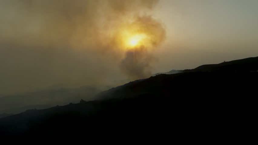 Etna on August 20, 2025. Effusive activity with lava flows, caves, spattering, hornito, and explosions from the southeast crater. Sunset with incandescent lava in Sicily.