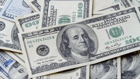 Shot Captures The Essence Of Economic Power. A Rotating Pile Of Us Dollars Symbolizes Cash Flow, Return On Investment, Income Streams, Corporate Success And Financial Freedom. - Powered by Shutterstock - Get 15% off with code: PIKWIZARD15