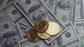 Bitcoin Currency And Us Dollars In Rotating.Bitcoin Gold Coins Spin Over American Banknotes. Visualizing Financial Transformation, Stock Trading, Wealth Management, And Crypto Market Expansion. - Powered by Shutterstock - Get 15% off with code: PIKWIZARD15