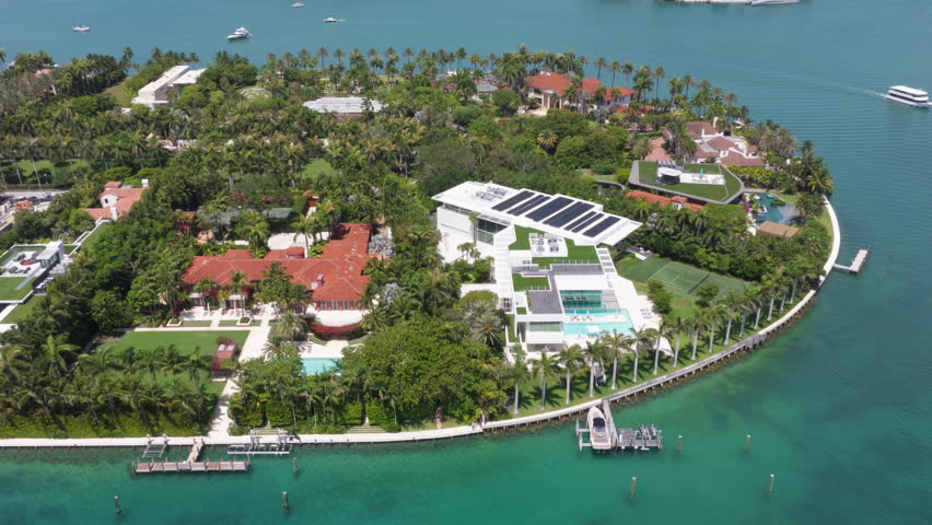 Waterfront residential area on Star island, Miami. Florida landscape view. Star Island in Miami beach, Florida. Residential buildings in luxury Star island surrounded by sea. Waterfront Estates