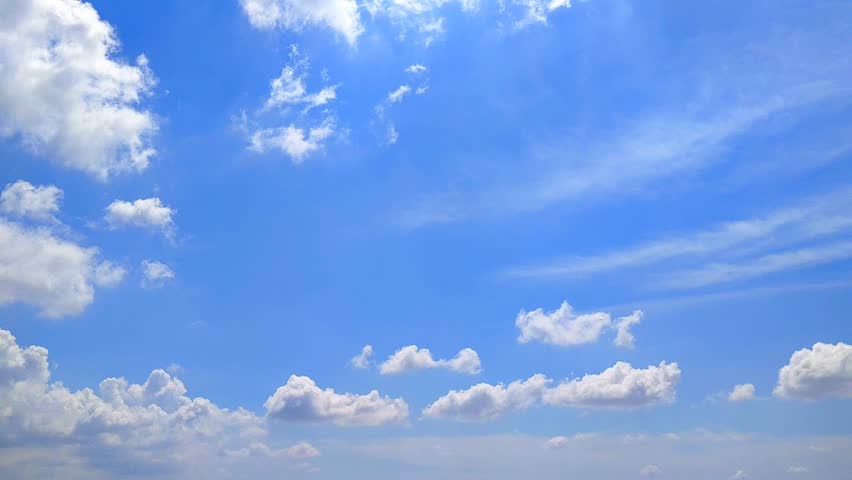 Beautiful dynamic blue sky with fluffy scattered white clouds, perfect for backgrounds, nature, and weather-related themes. cumulus clouds, cumulonimbus clouds 
 - Powered by Shutterstock - Get 15% off with code: PIKWIZARD15