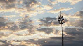 Time-Lapse of Football Stadium Lights Turning On at Sunset with Moving Clouds - Powered by Shutterstock - Get 15% off with code: PIKWIZARD15