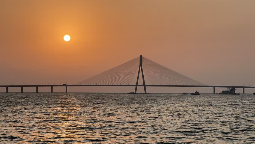 Time-lapse of Sunset Behind Bandra-Worli Sea Link, Mumbai – Silhouette of Iconic Bridge Over Arabian Sea