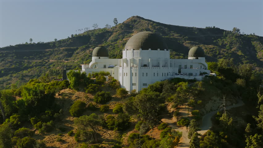 Discover the breathtaking aerial views of Griffith Observatory, surrounded by Los Angeles hills. Its stunning architecture and scenic landscapes make it a captivating destination