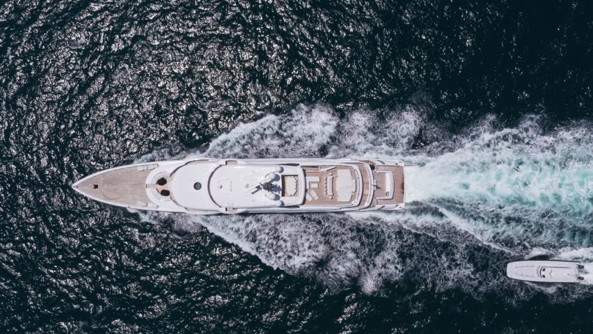 Luxury boat yachting. Motorboat sailing at sea. Luxury private yacht in sea. Motor yacht luxury vessel. Boat motor aerial. Vacation on summer. Aerial view motorboat. Yacht boat tour open ocean
